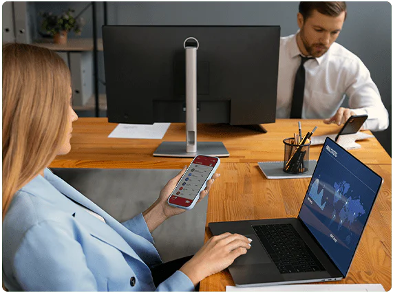 Employees using time and attendance software