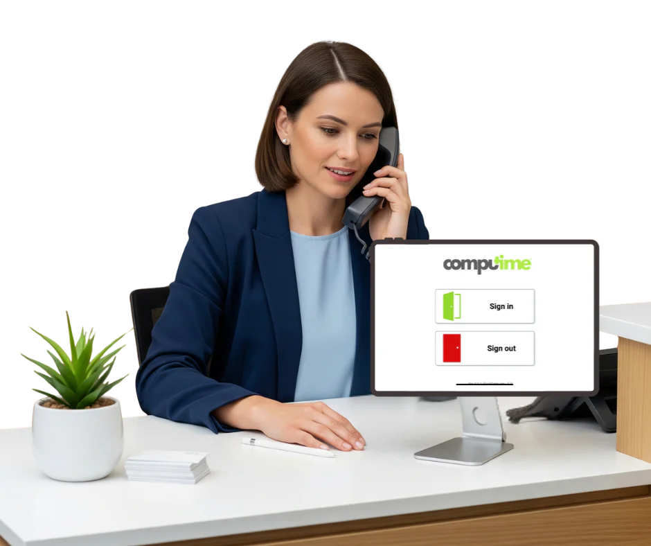 Receptionist at desk using Computime visitor management software on desktop computer with sign in and sign out buttons